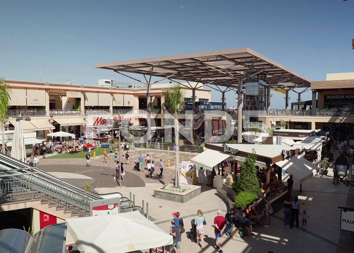 Bulevar plaza Zenia Boulevard, local shopping center i... | Stock Video | Pond5 photo