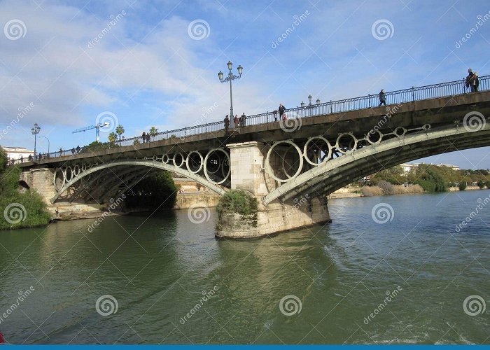 Triana Bridge - Isabel II Bridge Triana Bridge, or the Puente De Isabel II in Seville, Spain ... photo