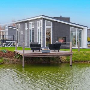 Modern Chalet On The Water At A Holiday Park เวเมลดิงเงอ Exterior photo